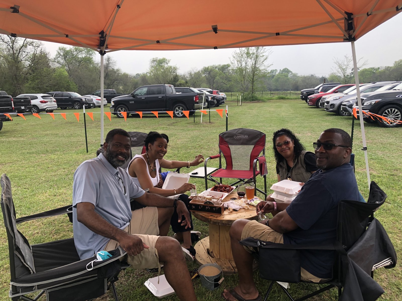 A gathering under the outdoor canopy